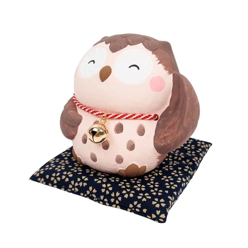 Figura di gufo giapponese del buon umore