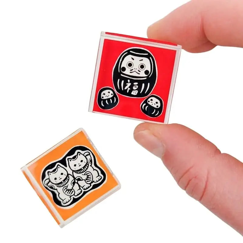 Francobollo giapponese Daruma di Tomikohan