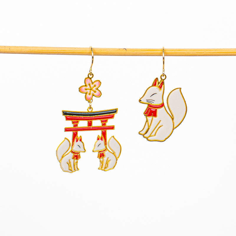 Orecchini giapponesi con motivi Torii e Kitsune