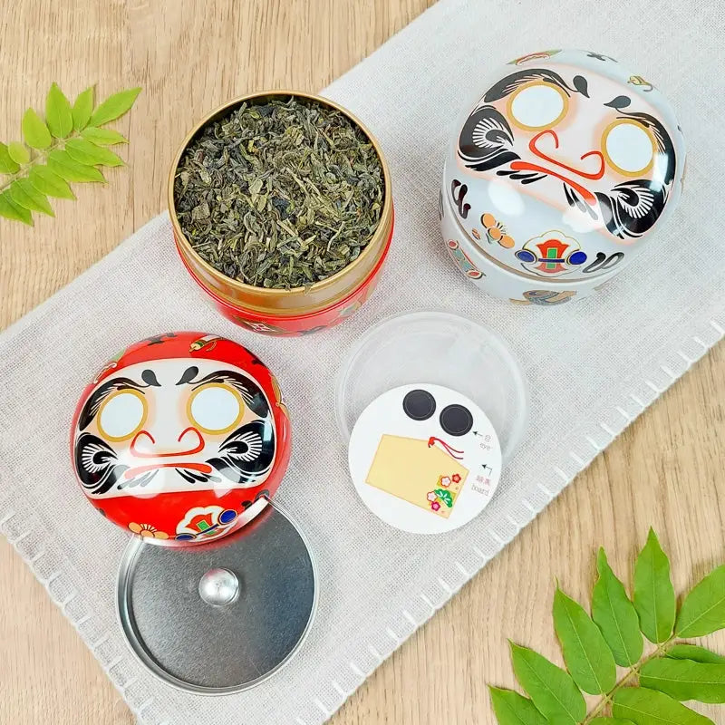 Scatola da tè Daruma in metallo bianco