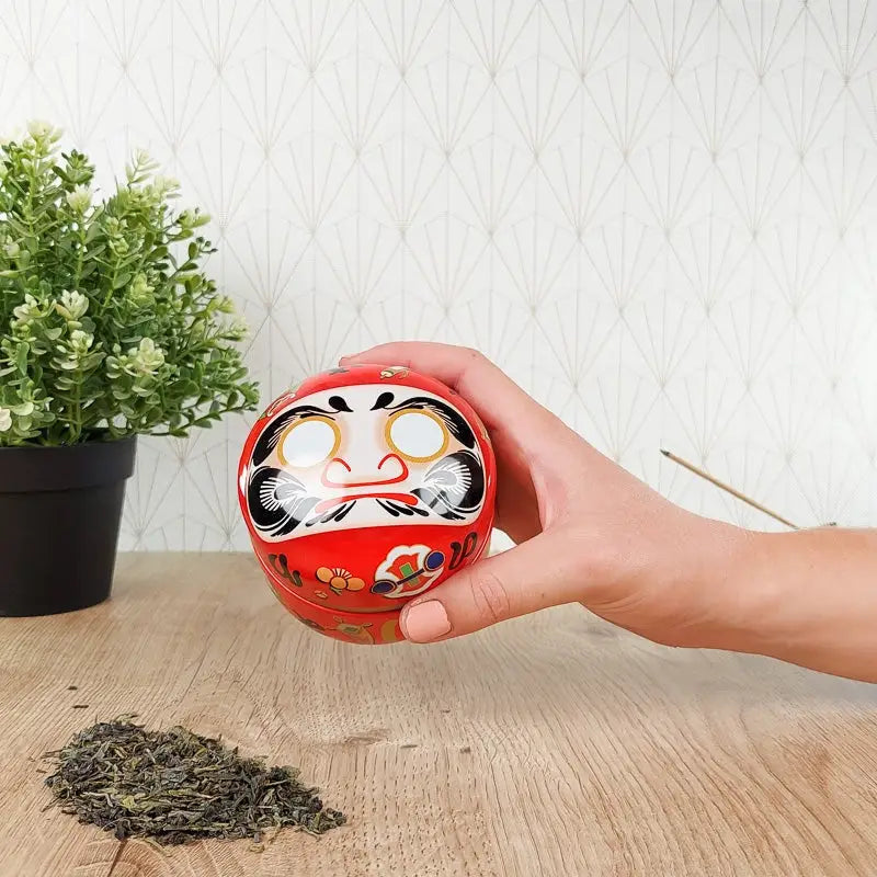 Scatola da tè Daruma in metallo rosso