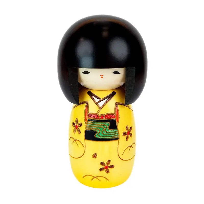 Bambola kokeshi gialla