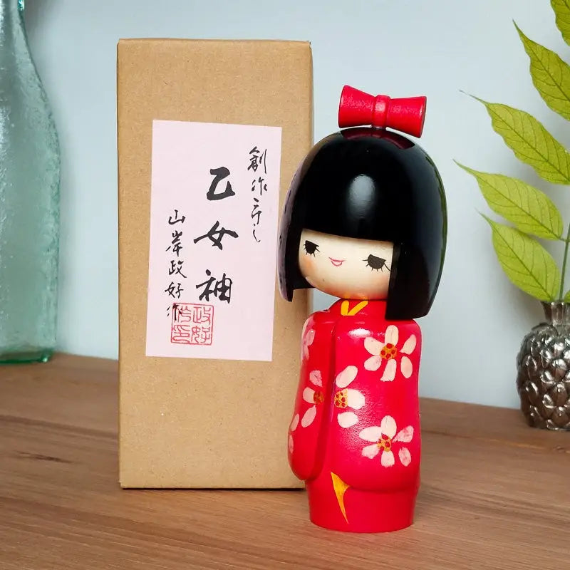 Bambola Kokeshi in legno