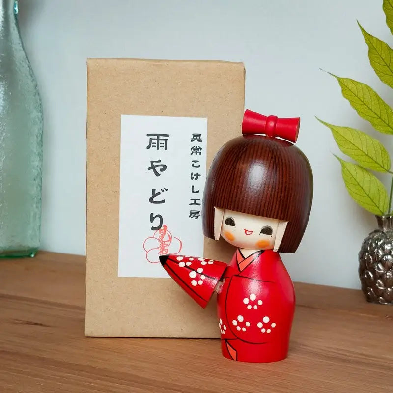 Bambola ombrello Kokeshi