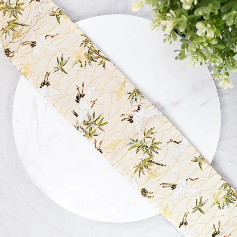 Cintura Obi beige con gru