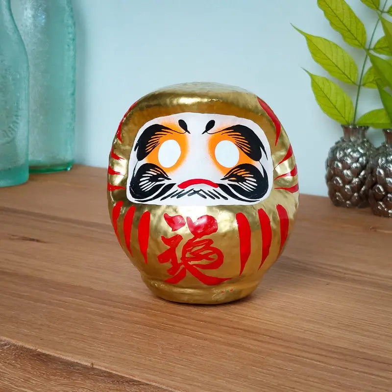 Daruma d'oro grande