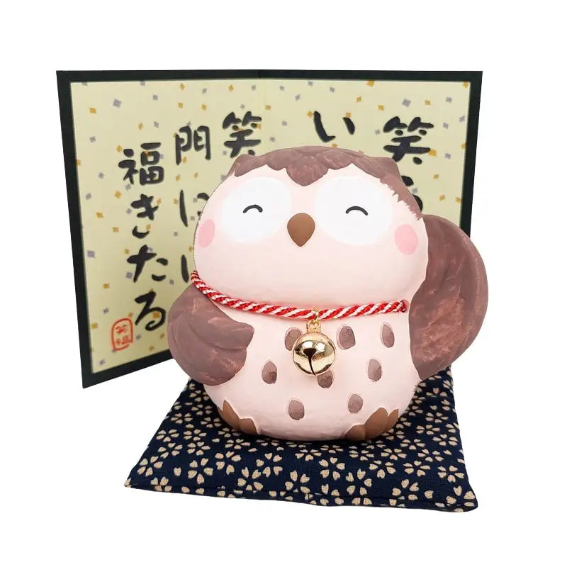 Figura di gufo giapponese del buon umore