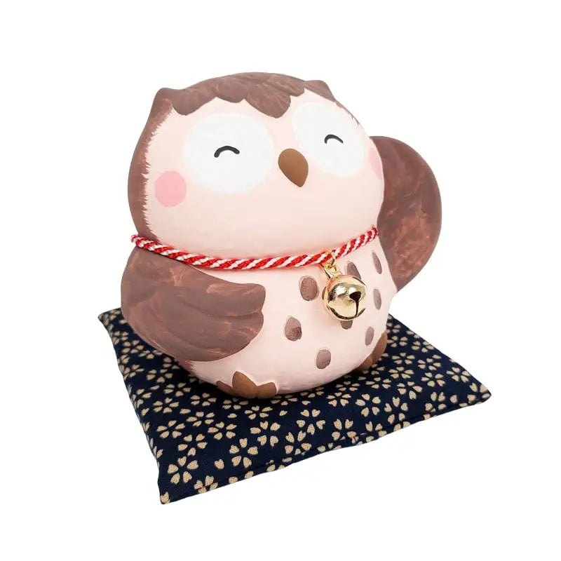 Figura di gufo giapponese del buon umore