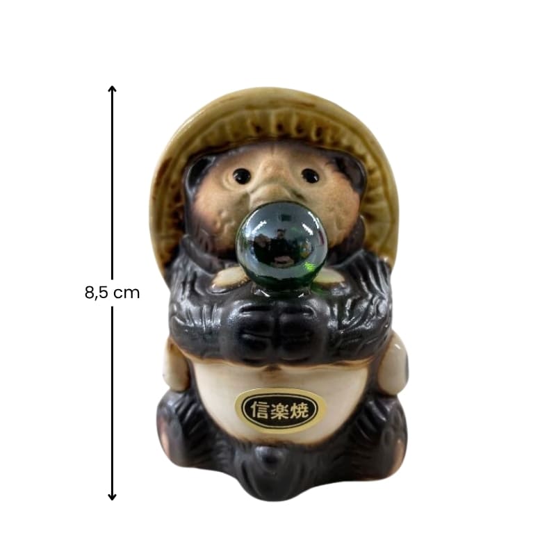 Figura Tanuki con perla verde