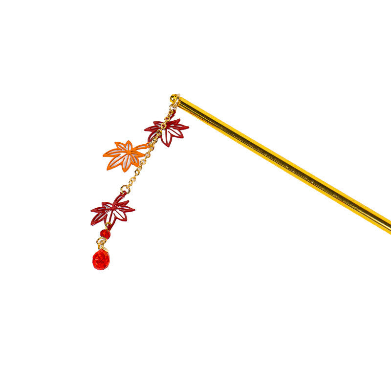 Kanzashi giapponese con foglie di momiji
