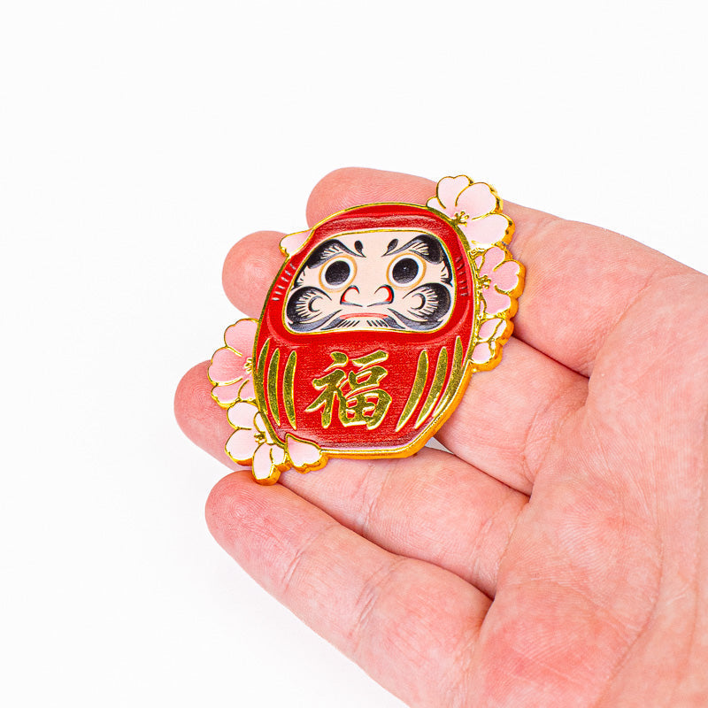 Magnete giapponese in metallo con Daruma e Sakura