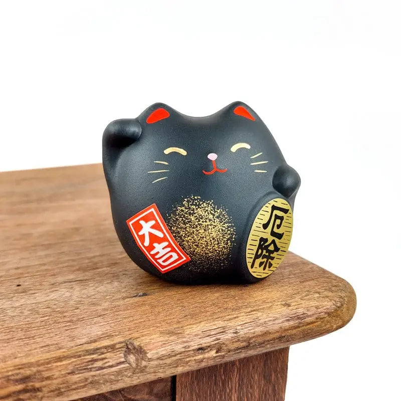 Maneki Neko rotondo nero