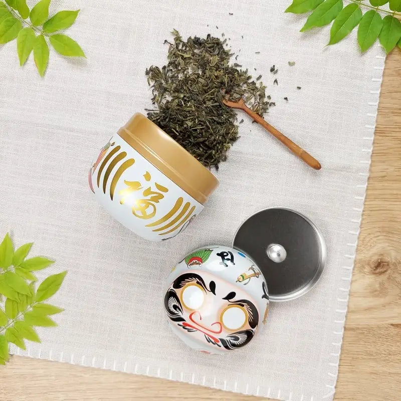 Scatola da tè Daruma in metallo bianco