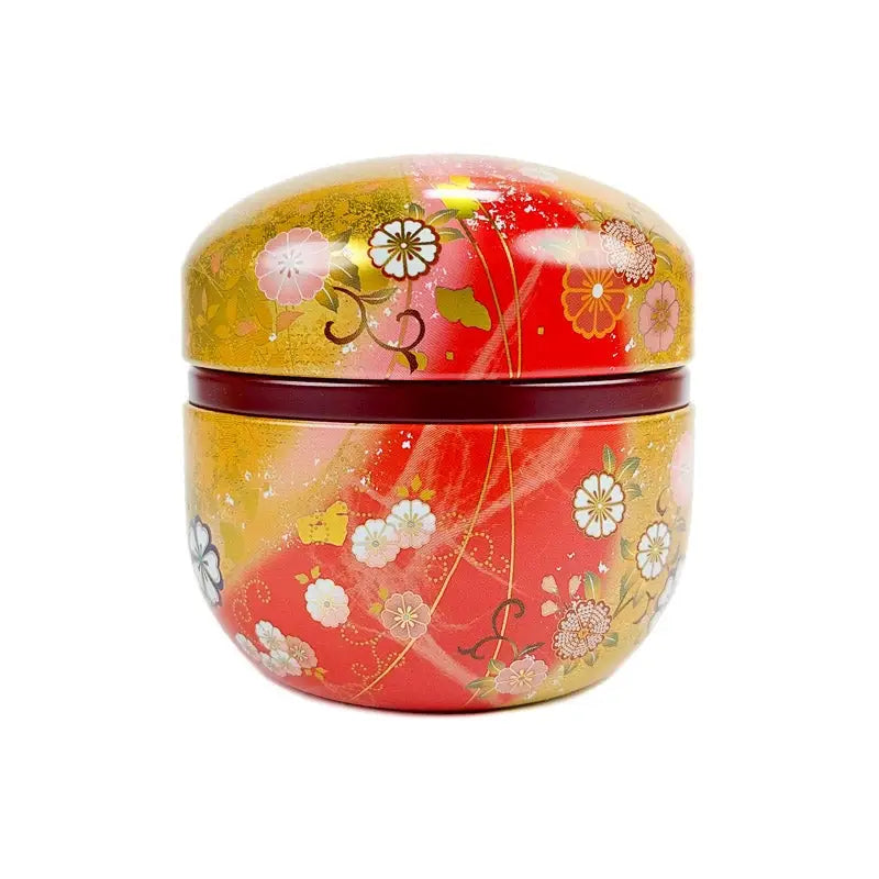 Scatola da tè rotonda in oro e rosso