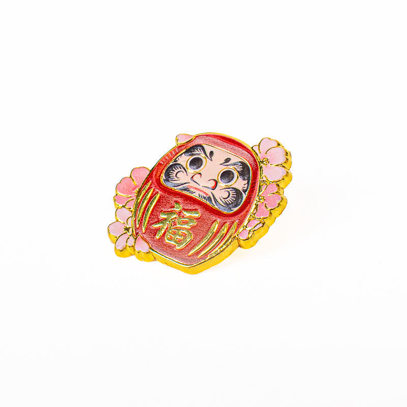 Spilla giapponese in metallo con Daruma e Sakura